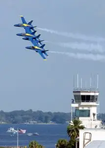 The Blue Angels fly in formation around the Operations Tower aboard Naval Air Station, Jacksonville. photo credit: Darryl Herring